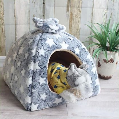 peluche dans niche pour chien étoiles