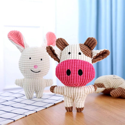 Peluche pour chien sur table de bois