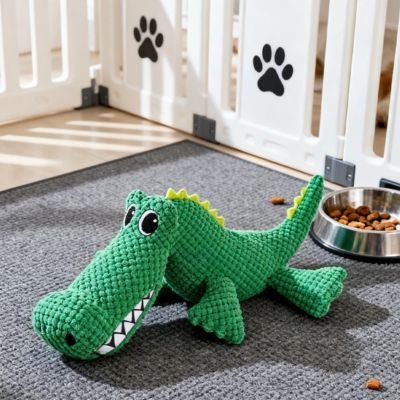 Peluche pour chien sur moquette