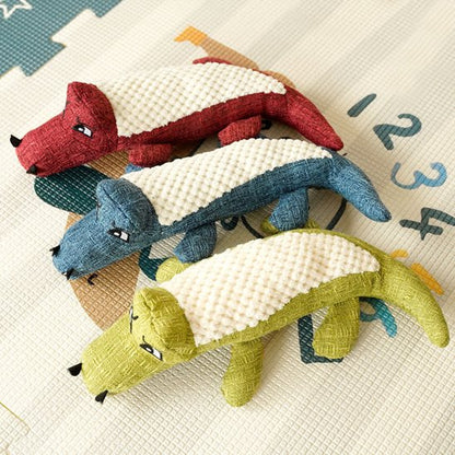 Peluche pour chien sur sol de jeu