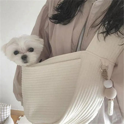 shitzu blanc dans sac de transport pour chien blanc